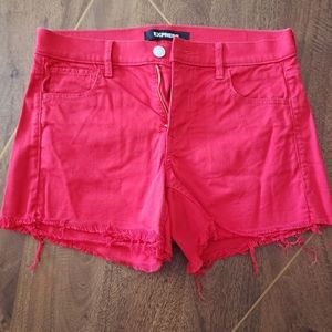 Red cutoff shorts